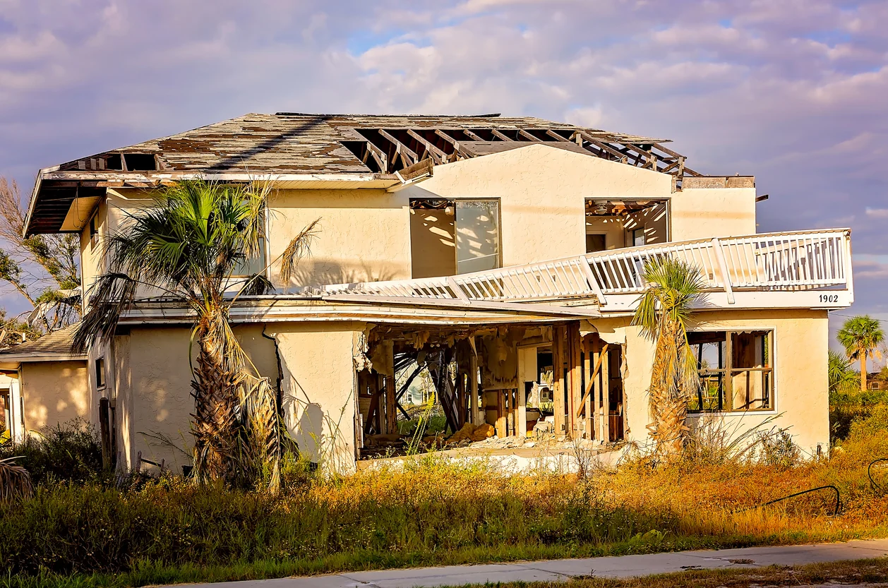 Home damaged by a storm being assessed by Gold Star Adjusters, a trusted West Palm Beach public adjuster